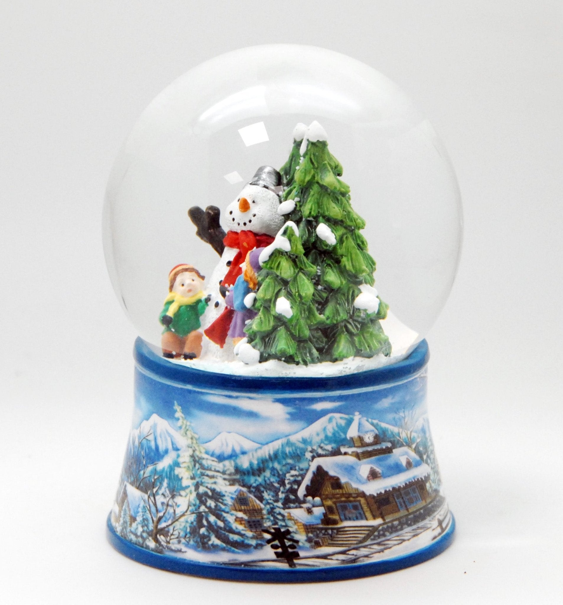 Nostalgische Schneekugel Kinder bauen Schneemann auf Sockel Winterlandschaft hellblau 100 mm Durchmesser mit Spieluhr - Schneekugelhaus