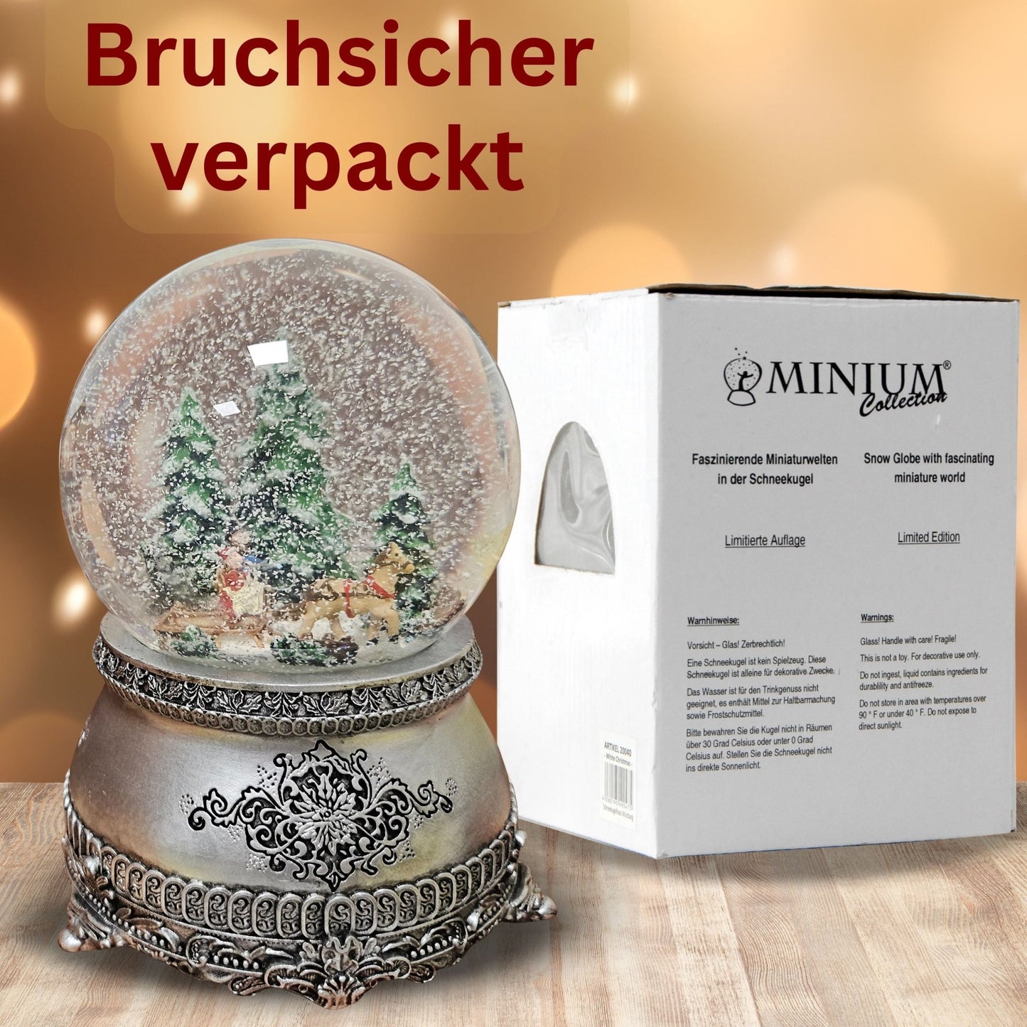 Nostalgische Schneekugel Schlittenfahrt auf Zinnsockel 100 mm Durchmesser mit Spieluhr - Schneekugelhaus