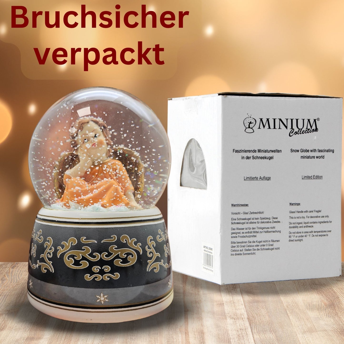 Schneekugel Engel terrakotta/schwarz mit Spieluhr 100 mm Durchmesser - Schneekugelhaus
