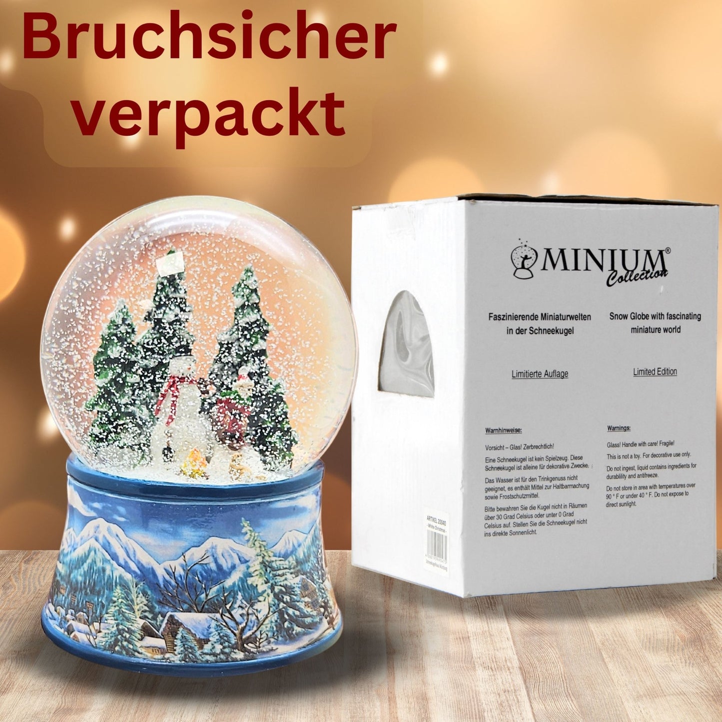 Schneekugel Schneemann mit Kind auf Schlitten mit Spieluhr 10 cm Durchmesser - Schneekugelhaus