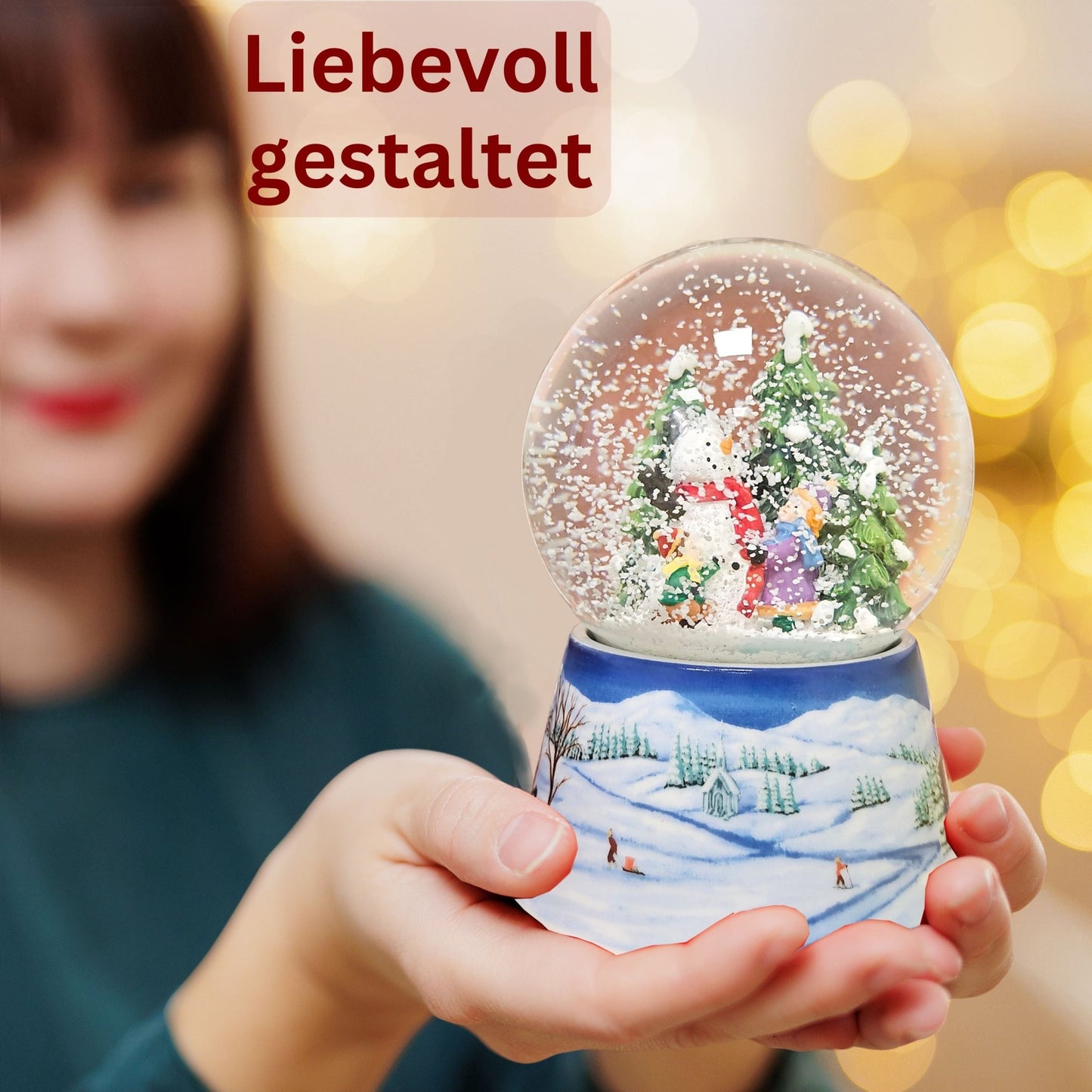 Schneekugel Schneemann zwei Kinder auf Sockel Winterlandschaft mittelblau mit Spieluhr 10 cm Durchmesser - Schneekugelhaus