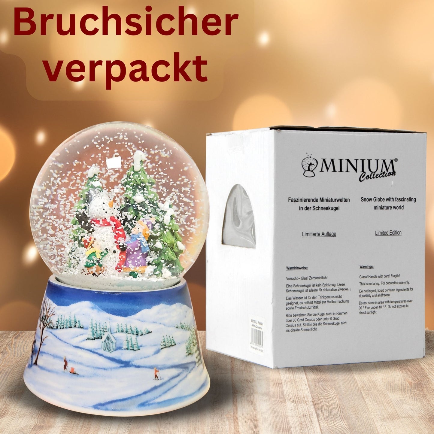 Schneekugel Schneemann zwei Kinder auf Sockel Winterlandschaft mittelblau mit Spieluhr 10 cm Durchmesser - Schneekugelhaus