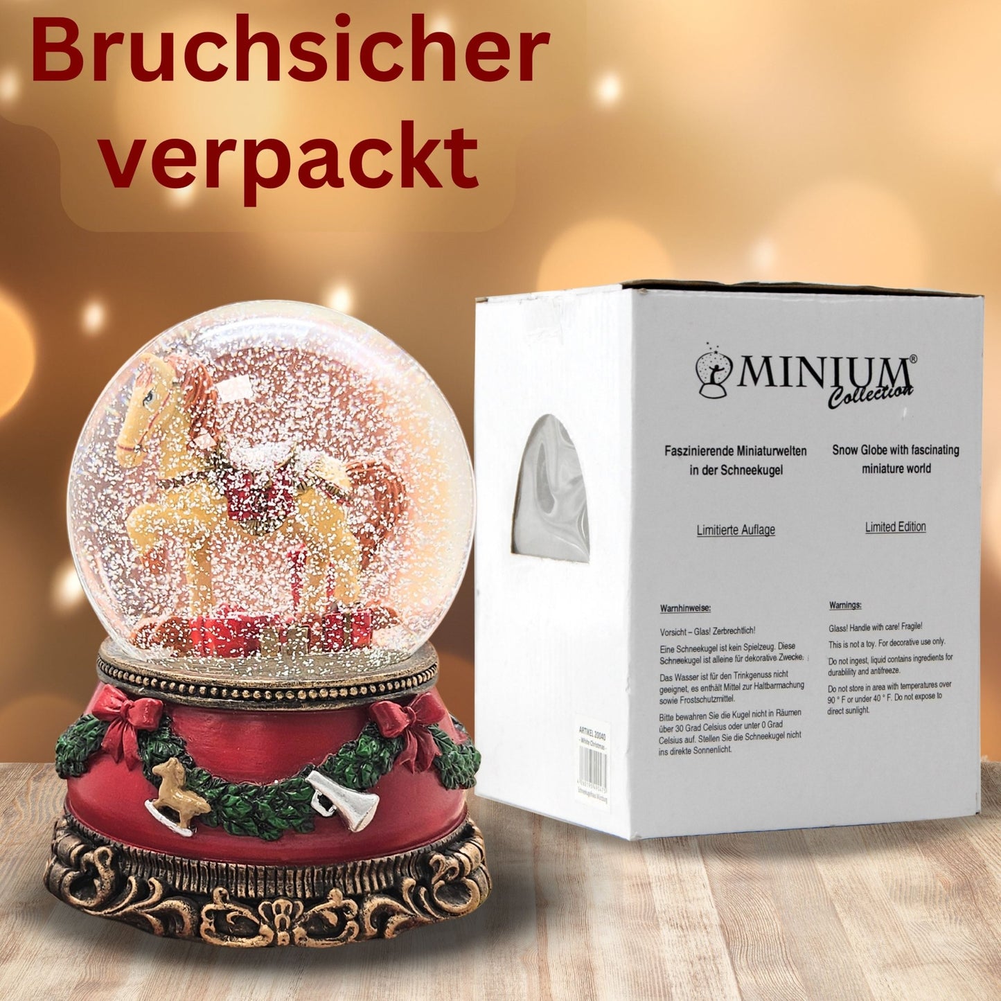 Schöne Schneekugel Schaukelpferd mit Geschenken auf Sockel Weihnachtsdekor rot mm Durchmesser mit Spieluhr - Schneekugelhaus