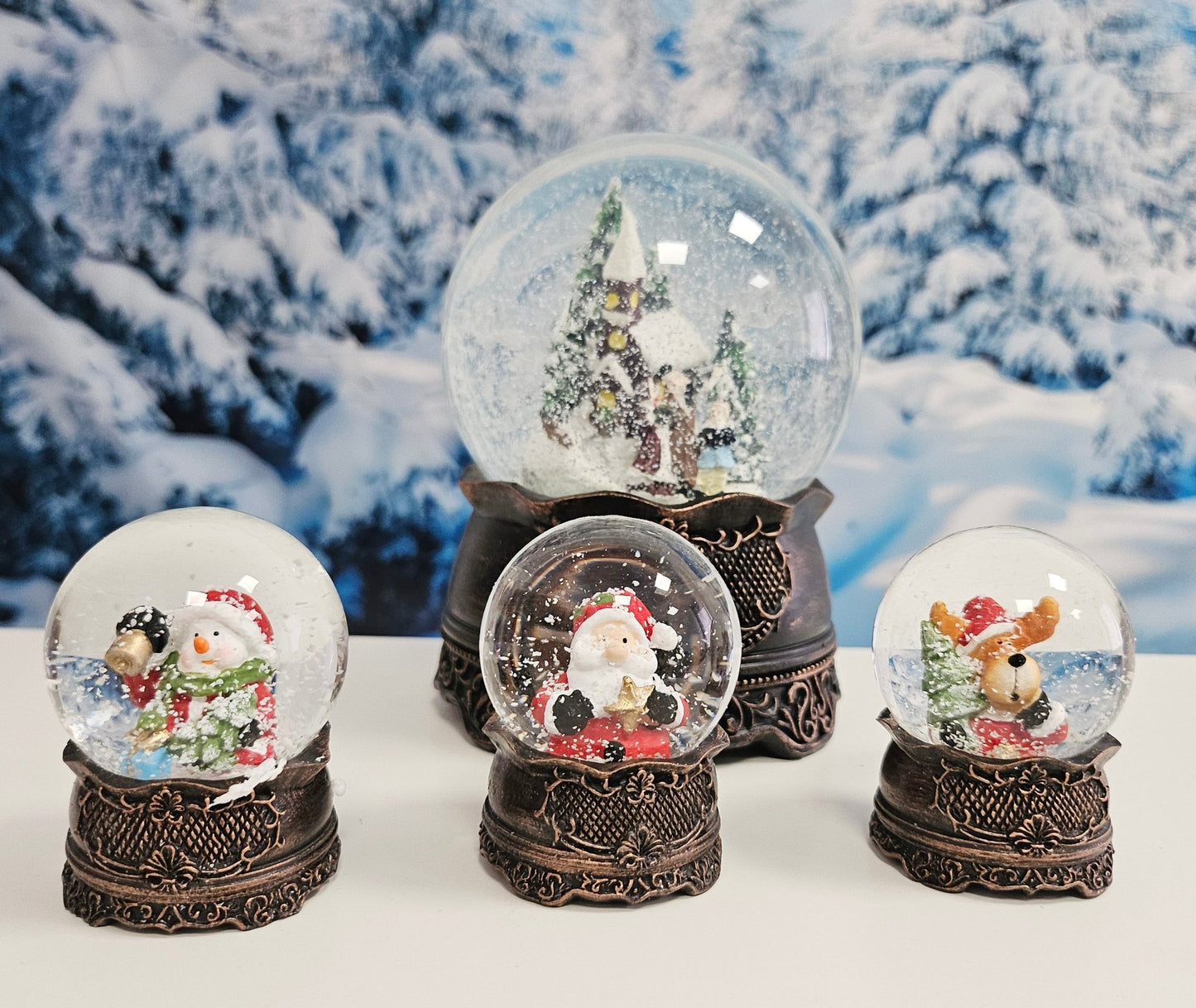 Süße Mini - Schneekugeln Weihnachtselch auf Sockel antik kupfer Landschaft B: 45mm - Schneekugelhaus