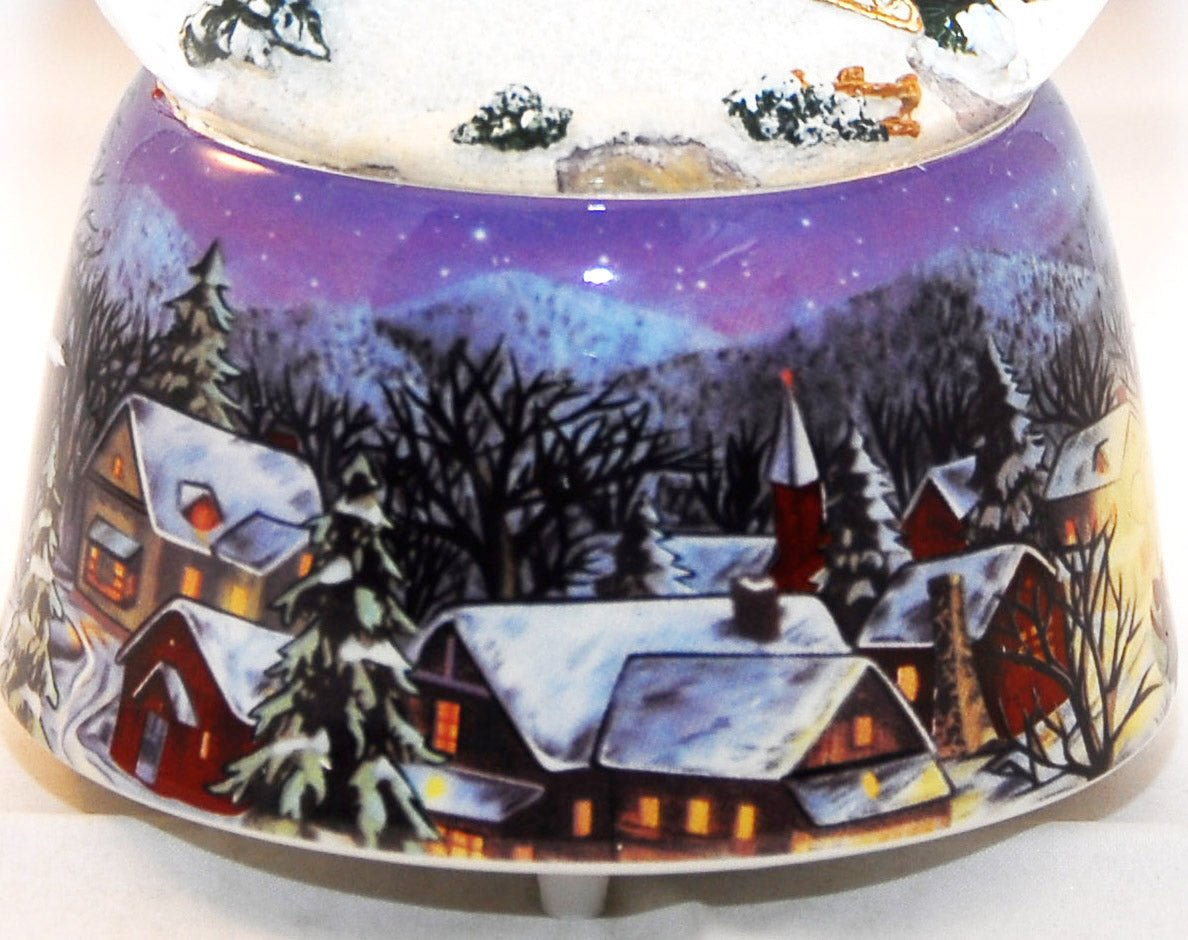 Santa bringt Geschenke mit Spieluhr - Schneekugelhaus