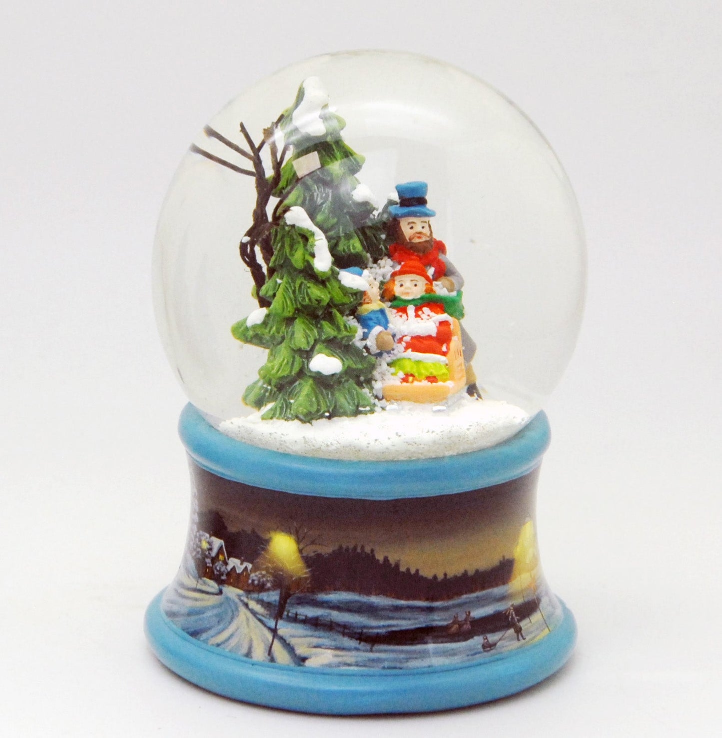 Schneekugel Familie im Winterwald mit Schlitten auf Sockel Winterlandschaft Eisläufer blau mit Spieluhr - Schneekugelhaus