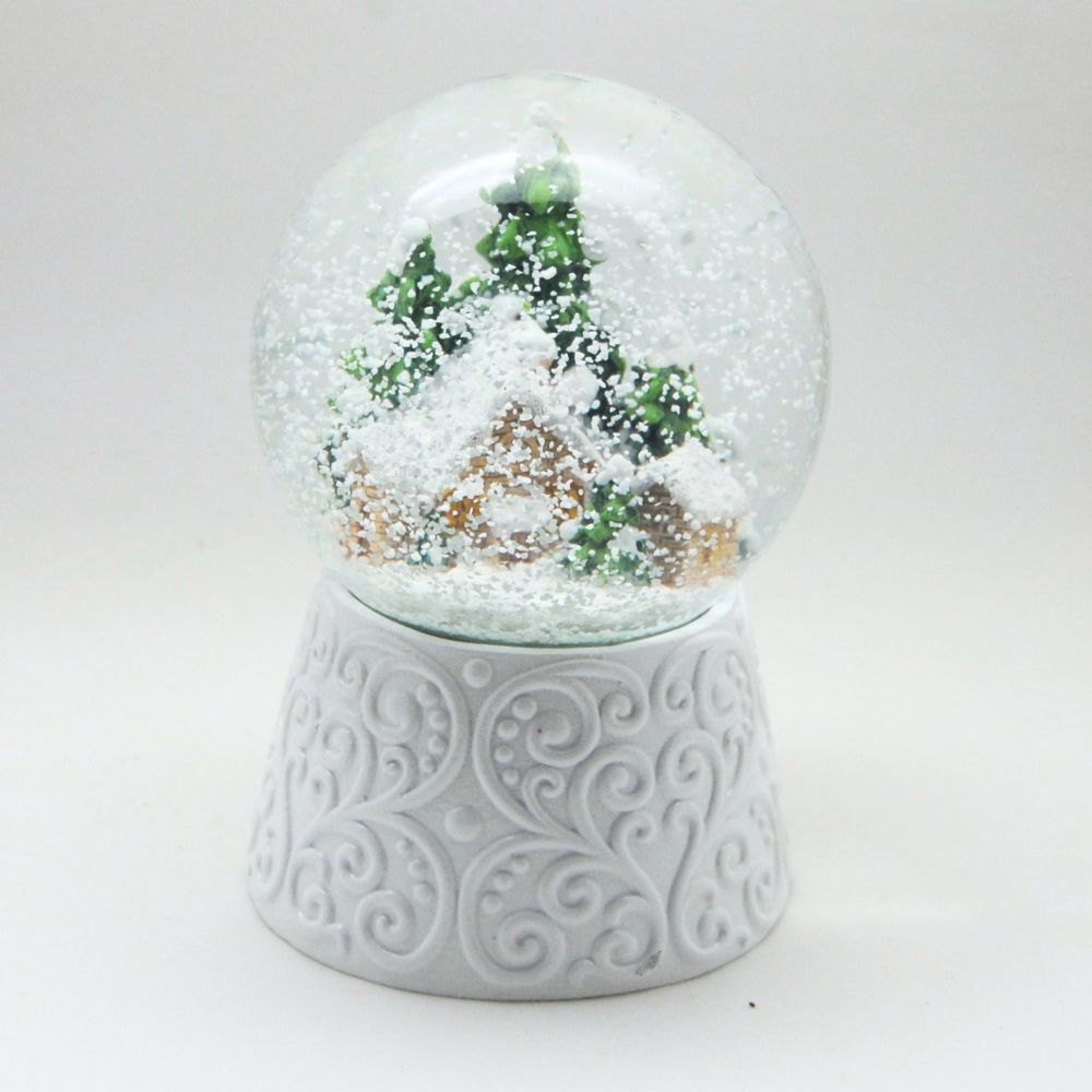 Edle Schneekugel Hüttenzauber Berghütte auf weißem Ornamentsockel 100 mm Durchmesser mit Spieluhr