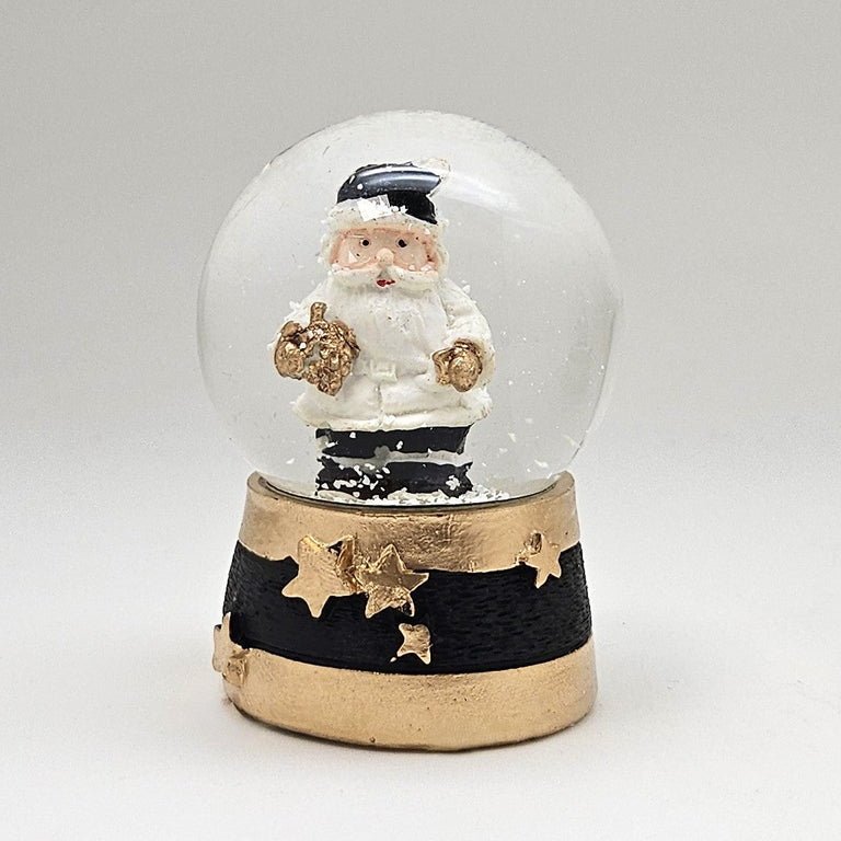 Moderne Mini - Schneekugel Weihnachtsmann schwarz weiß auf Sockel gold schwarz Sterne B: 45mm - Schneekugelhaus