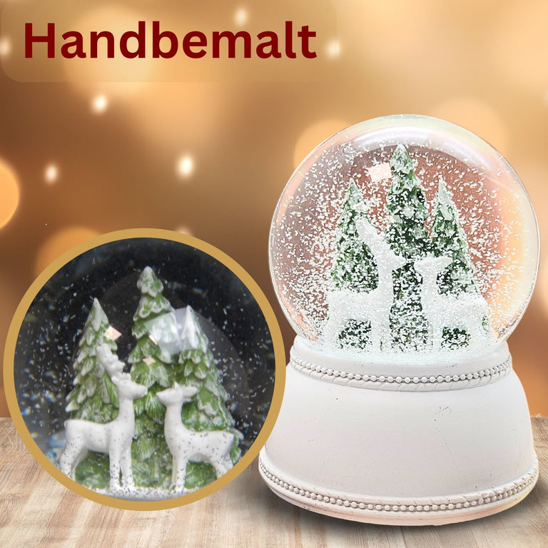 Nostalgische Schneekugel 2 Rehe vor Tannenbäumen auf Sockel weiß Nostalgie 100 mm Durchmesser mit Spieluhr - Schneekugelhaus