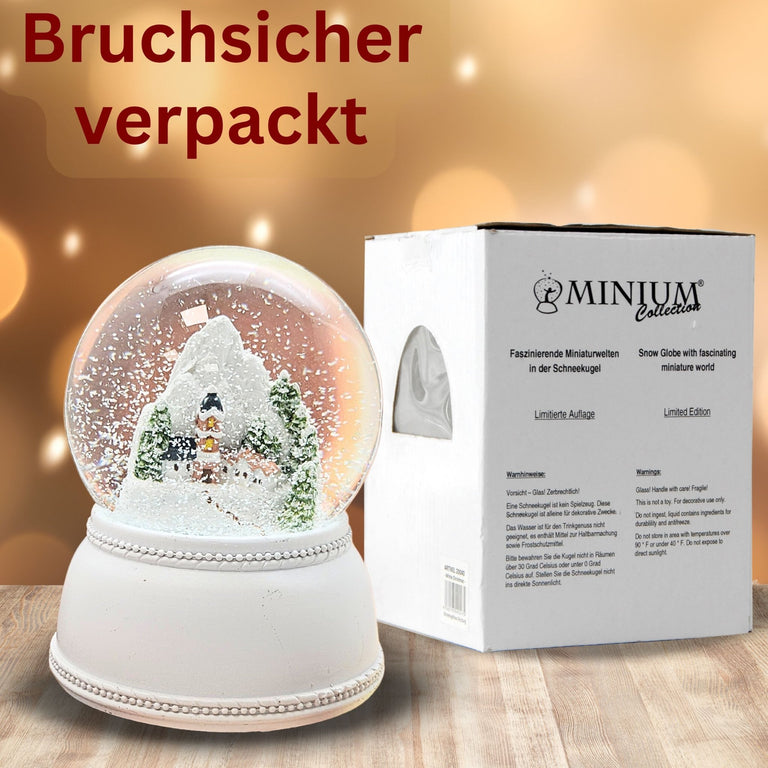 Nostalgische Schneekugel Alpendorf auf Sockel weiß Nostalgie 100 mm Durchmesser mit Spieluhr - Schneekugelhaus