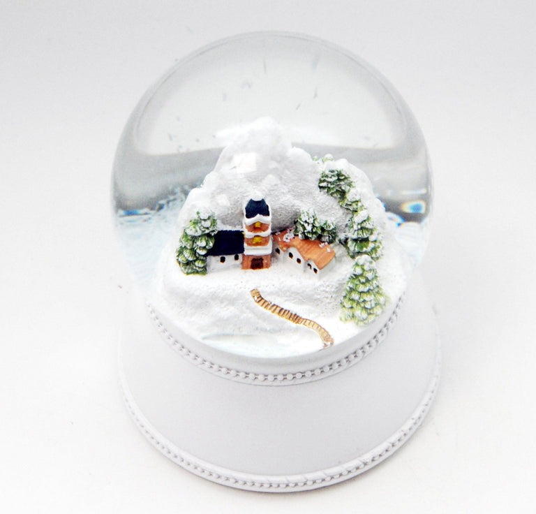 Nostalgische Schneekugel Alpendorf auf Sockel weiß Nostalgie 100 mm Durchmesser mit Spieluhr - Schneekugelhaus
