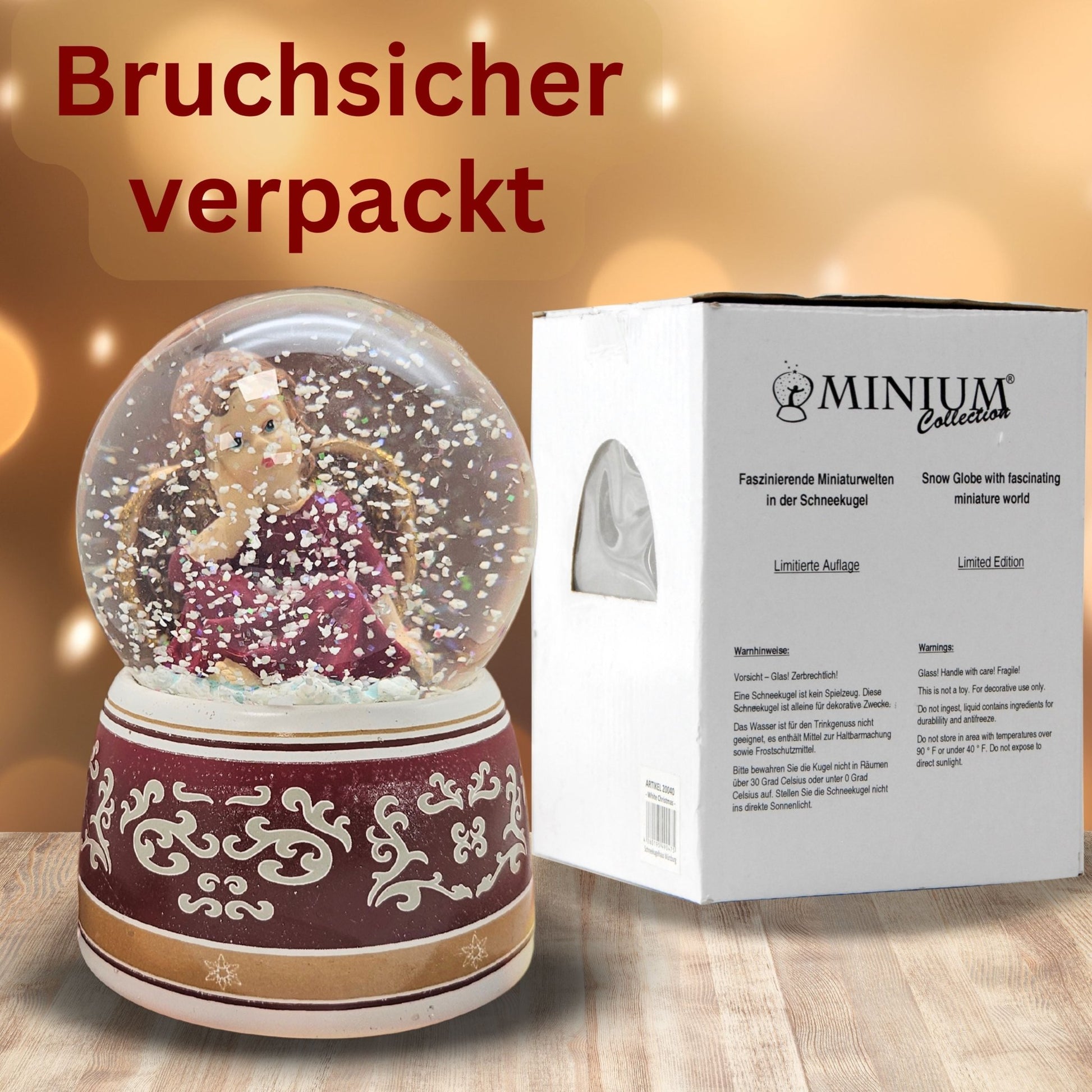 Schneekugel Engel rot mit Spieluhr 100 mm Durchmesser - Schneekugelhaus