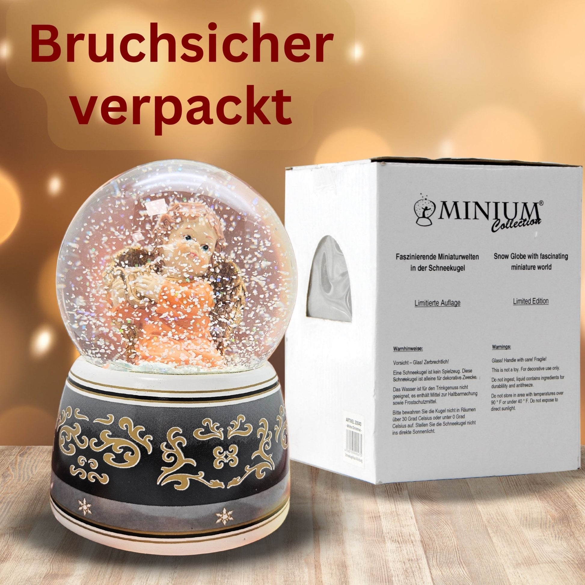 Schneekugel Engel terrakotta/schwarz mit Harfe mit Spieluhr 100 mm Durchmesser - Schneekugelhaus