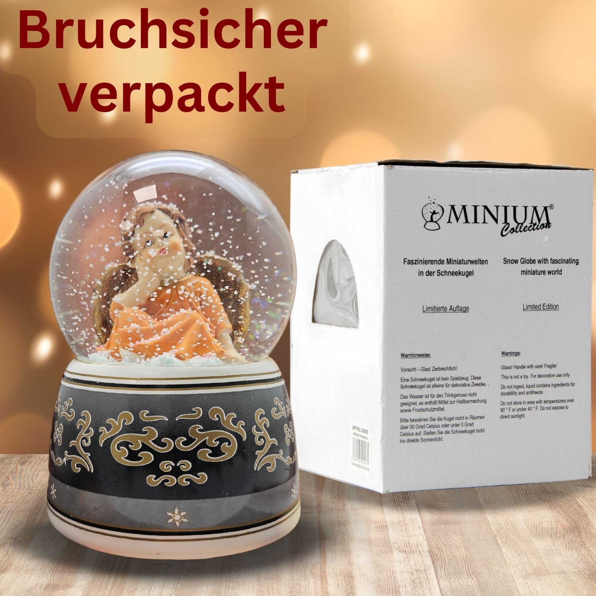 Schneekugel Engel terrakotta/schwarz mit Spieluhr 100 mm Durchmesser - Schneekugelhaus