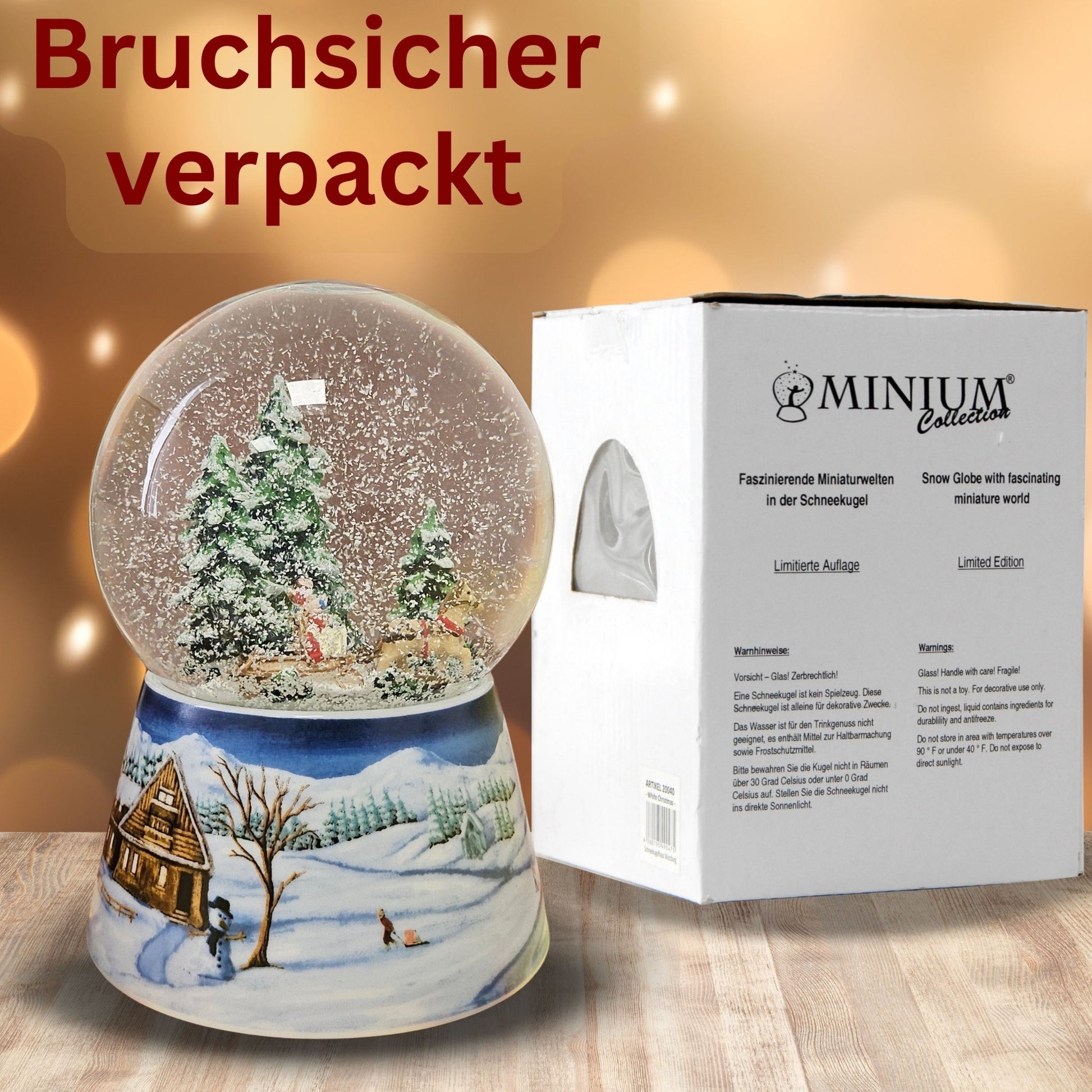 Schneekugel Kutschfahrt auf Sockel Winterlandschaft mittelblau mit Spieluhr 10 cm Durchmesser - Schneekugelhaus