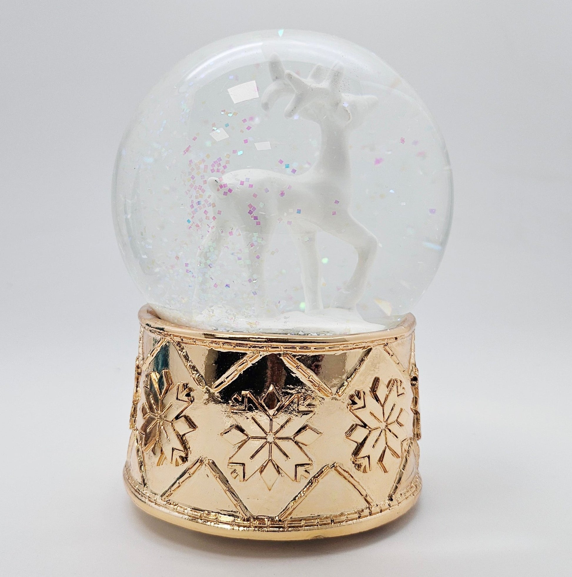 Schneekugel Reh weiß mit kupfergold-Sockel Schneeflocke mit Spieluhr - Schneekugelhaus
