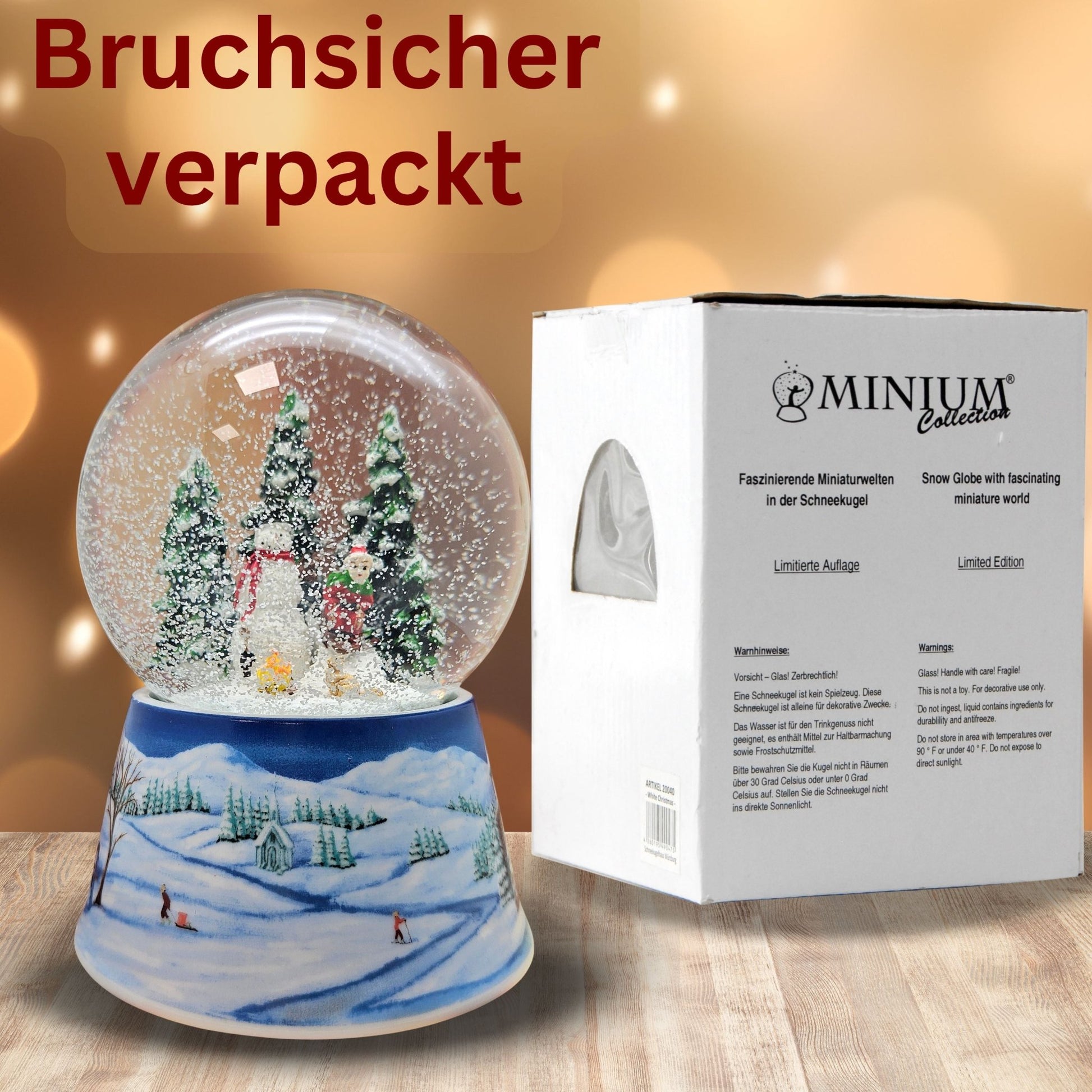 Schneekugel Schneemann bauen mit Lagerfeuer auf Sockel Winterlandschaft mit Spieluhr 10 cm Durchmesser - Schneekugelhaus