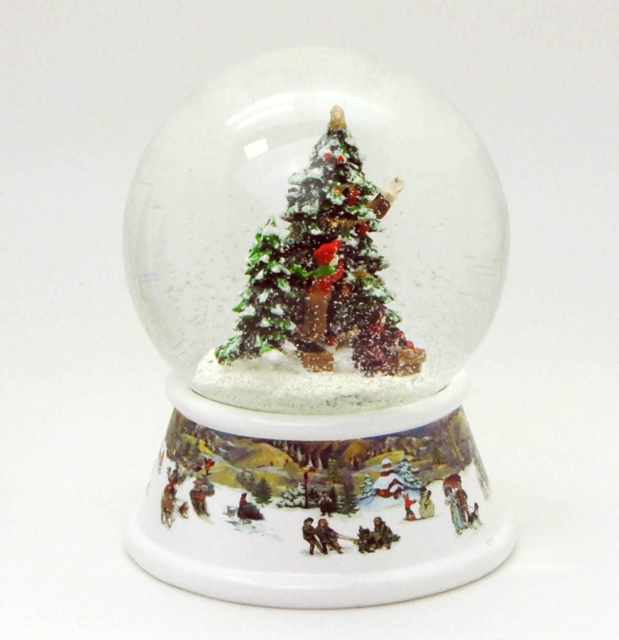 Schneekugel Weihnachtsbaum schmücken mit Geschenken auf Sockel nostalgische Schneelandschaft mit Spieluhr 10 cm Durchmesser - Schneekugelhaus