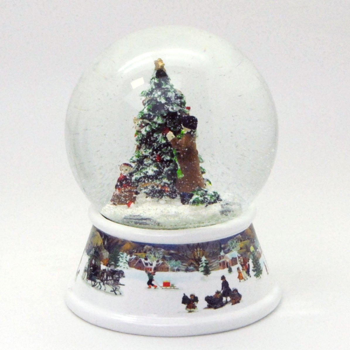 Schneekugel Weihnachtsbaum schmücken mit Geschenken auf Sockel nostalgische Schneelandschaft mit Spieluhr 10 cm Durchmesser - Schneekugelhaus