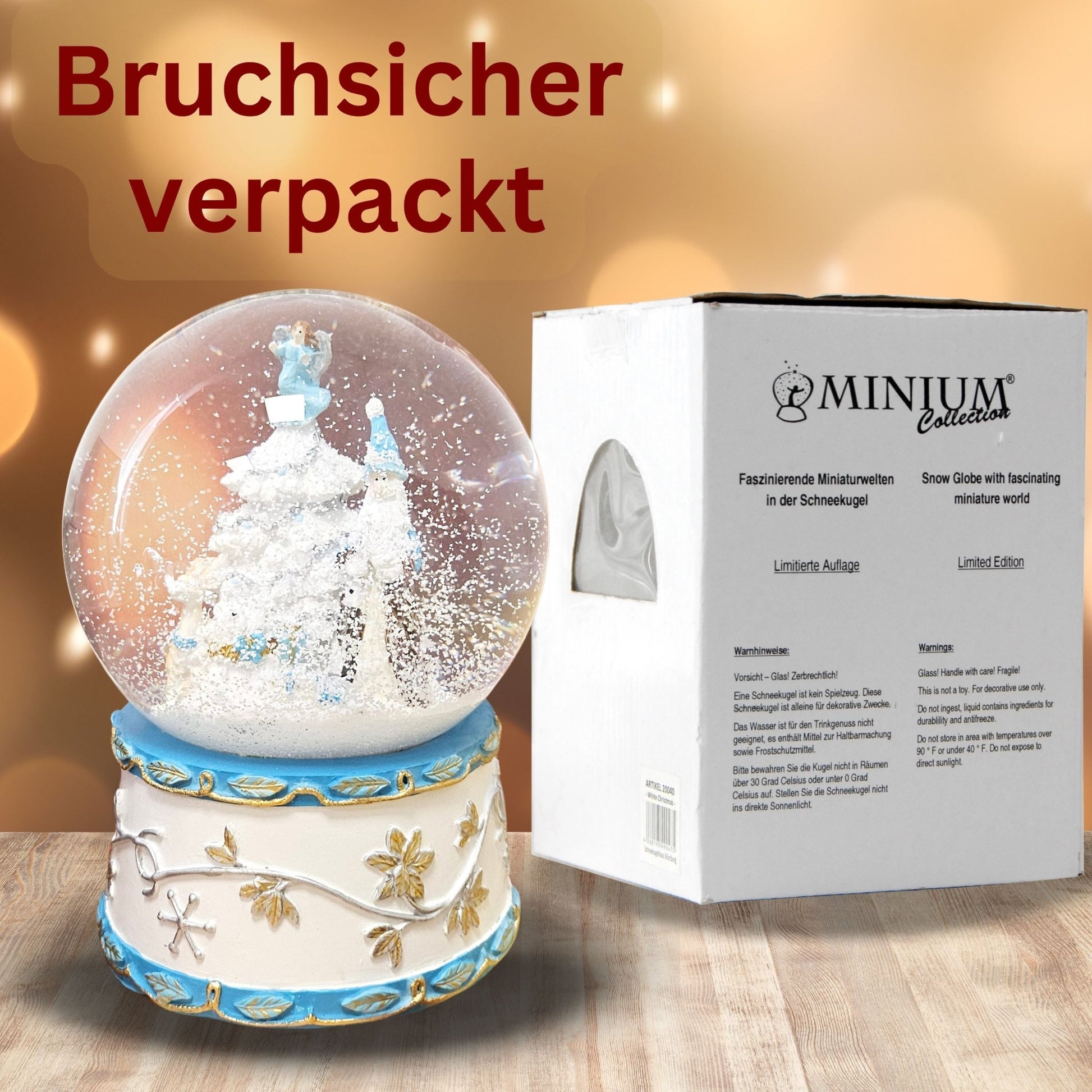 Schneekugel Weihnachtsmann mit Spieluhr, blau silber - 120 mm Durchmesser - Schneekugelhaus
