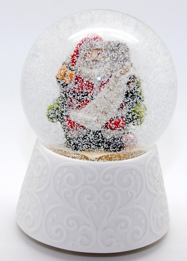 Edle Schneekugel auf weißem Porzellansockel Santa mit Spieluhr - Schneekugelhaus