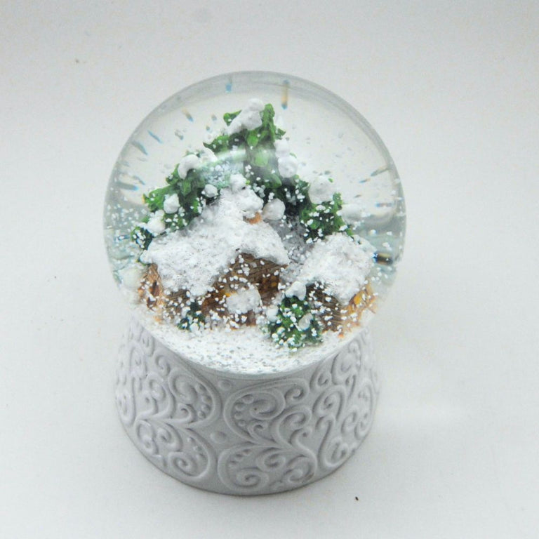 Edle Schneekugel Hüttenzauber Berghütte auf weißem Ornamentsockel 100 mm Durchmesser mit Spieluhr - Schneekugelhaus