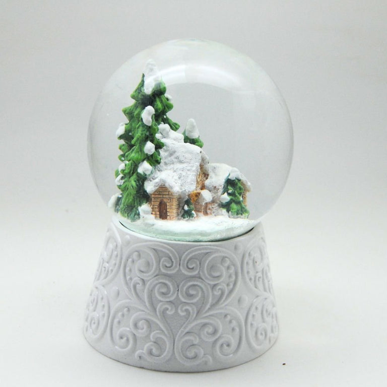Edle Schneekugel Hüttenzauber Berghütte auf weißem Ornamentsockel 100 mm Durchmesser mit Spieluhr - Schneekugelhaus
