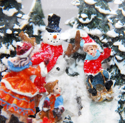 Mega-Schneekugel Romantisches Lagerfeuer mit Schneemann mit Musik, Licht und Snowmotion - Schneekugelhaus