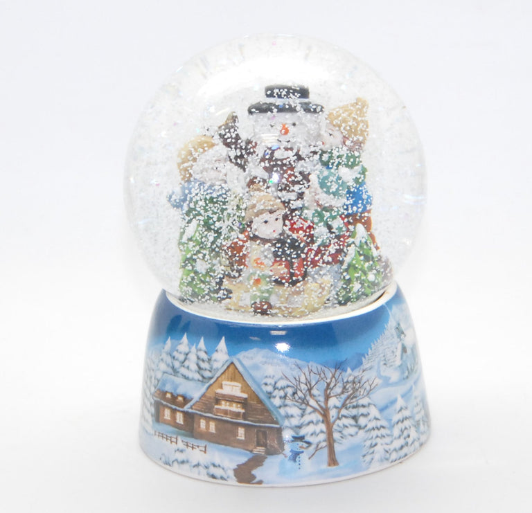 Schneekugel Kinder bauen Schneemann auf Sockel Winterlandschaft mit Spieluhr - Schneekugelhaus