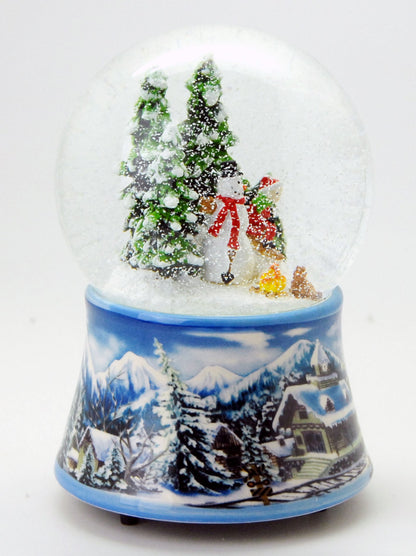 Schneekugel Schneemann mit Kind auf Schlitten mit Spieluhr 10 cm Durchmesser - Schneekugelhaus