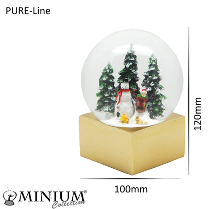 Schneekugel Schneemann steht vor Lagerfeuer auf Sockel golden eckig "PURE-Line" 10 cm Durchmesser - Schneekugelhaus