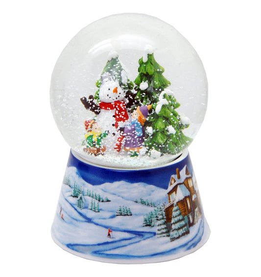 Schneekugel Schneemann zwei Kinder auf Sockel Winterlandschaft mittelblau mit Spieluhr 10 cm Durchmesser - Schneekugelhaus