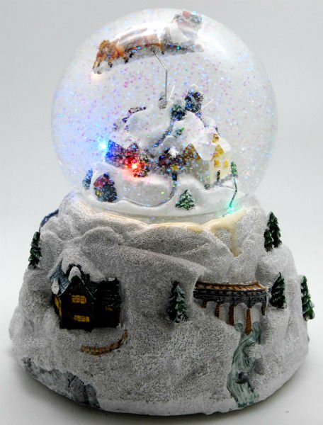 Schneekugel Weihnacht Fliegender Santa mit Spieluhr - Schneekugelhaus