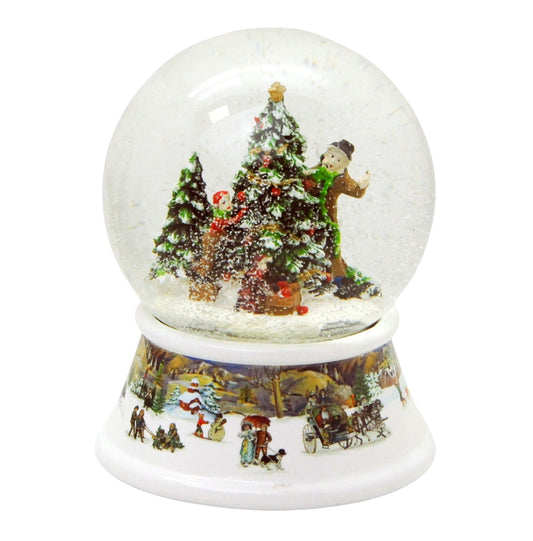 Schneekugel Weihnachtsbaum schmücken mit Geschenken auf Sockel nostalgische Schneelandschaft mit Spieluhr - Schneekugelhaus