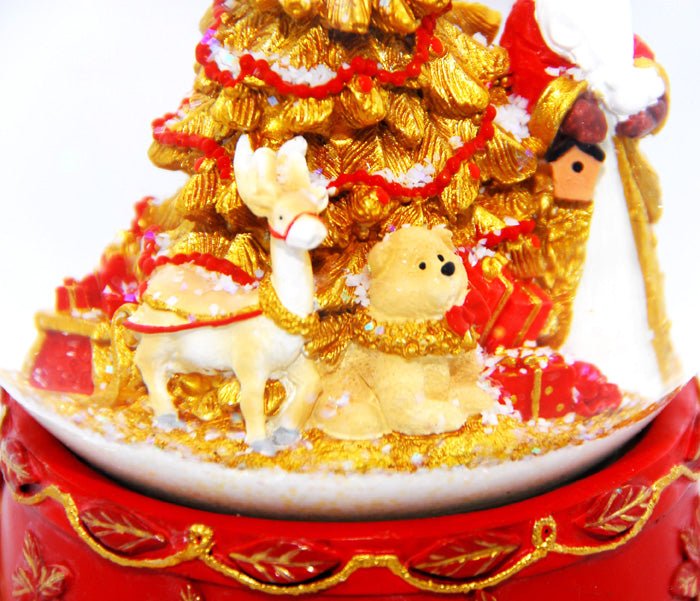 Schneekugel Weihnachtsmann mit Spieluhr rot groß - Schneekugelhaus