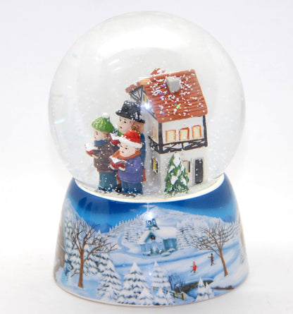 Schneekugel Weihnachtssinger vor Fachwerkhaus auf Sockel Winterlandschaft mit Spieluhr - Schneekugelhaus